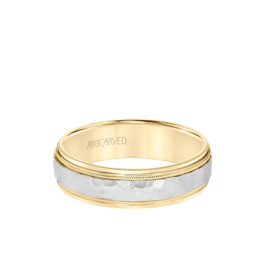 Hammered men’s wedding band showing milgrain edge and polished sides