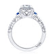 Emerald 3-Stone Engagement Ring with Blue Sapphires