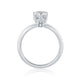 From the Classics collection, this 6 prong solitaire engagement ring features a high shine shank and a touch of pave diamonds under the crown. ME1689/204