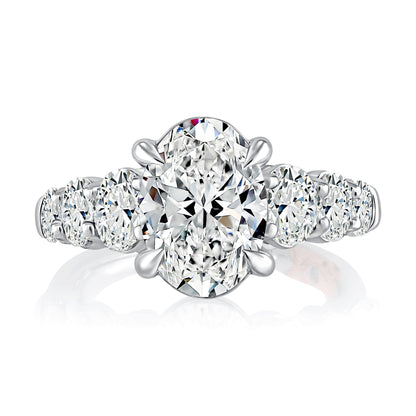 Classic Four Prong Oval Cut Diamond Flanked Engagement Ring MECOV2855/326