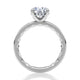 A timeless solitaire engagement ring showcasing an round-cut center diamond. Its clean, elegant lines make it an enduring choice for those who appreciate refined simplicity. MECRD2959Q/79