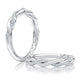 This wedding band features two alternating bands with hand set Pavé sparkling diamonds. Made for the modern bride who prefer the petite look and feel. MRCOV2544/11