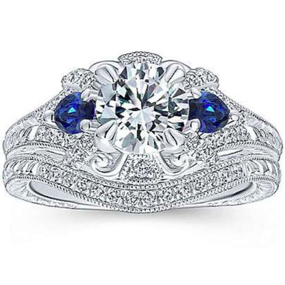 Gabriel "Chrystie" Diamond & Blue Sapphire Halo Engagement Ring